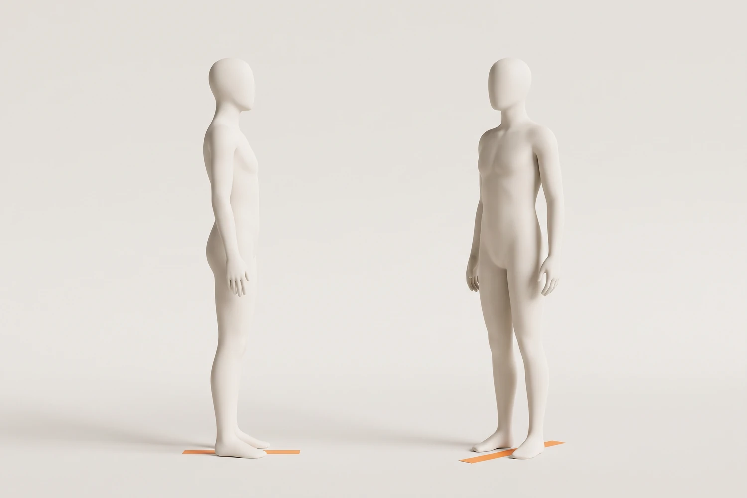 Two mannequins on orange floor tape: on the left a full 90-degree side profile, on the right a partial turn with the chest twisted back toward the camera